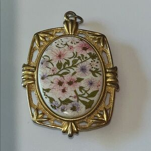 Vintage J.J. Floral and gold tone perfume pendant Locket